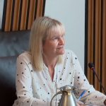 Sharon at her desk in the audit office